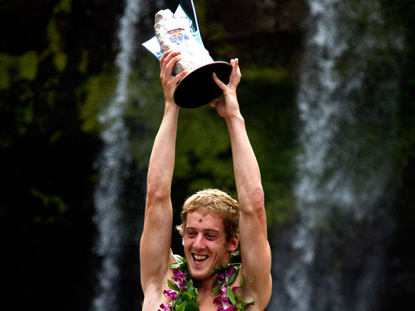 Gary Hunt of England celebrating the world series win at Kawainui Falls during the sixth and final round of the 2010 Red Bull Cliff Diving World Series in Hilo, Hawaii. (AFP)