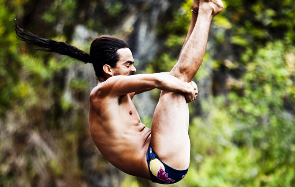 Orlando Duque of Colombia diving from the 27-metre platform at Kawainui Falls during the sixth and final round of the 2010 Red Bull Cliff Diving World Series in Hilo, Hawaii. The series was won by Gary Hunt of England. (AFP)