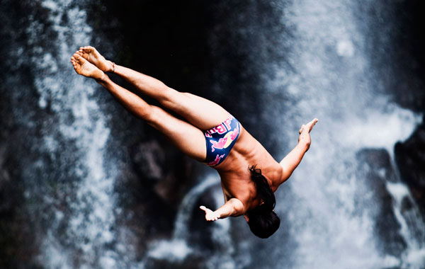 Orlando Duque of Colombia diving from the 27-metre platform at Kawainui Falls during the sixth and final round of the 2010 Red Bull Cliff Diving World Series in Hilo, Hawaii. (AFP)