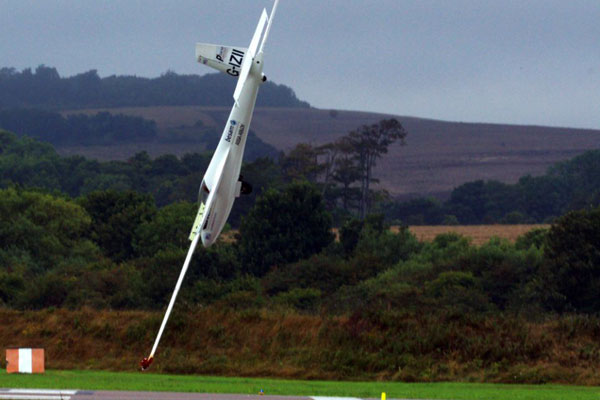 Inches from disaster: Mike Newman's glider is out of control and heading for the ground.(FILE)