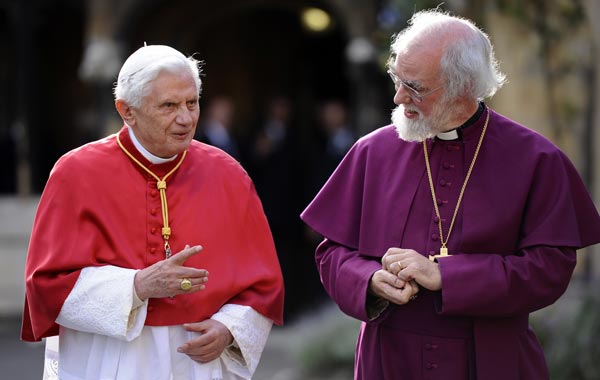 Pope Benedict XVI talks with The Archbishop of Canterbury, Rowan Williams, as they walk through his official residence, Lambeth Palace, in central London. (AFP)