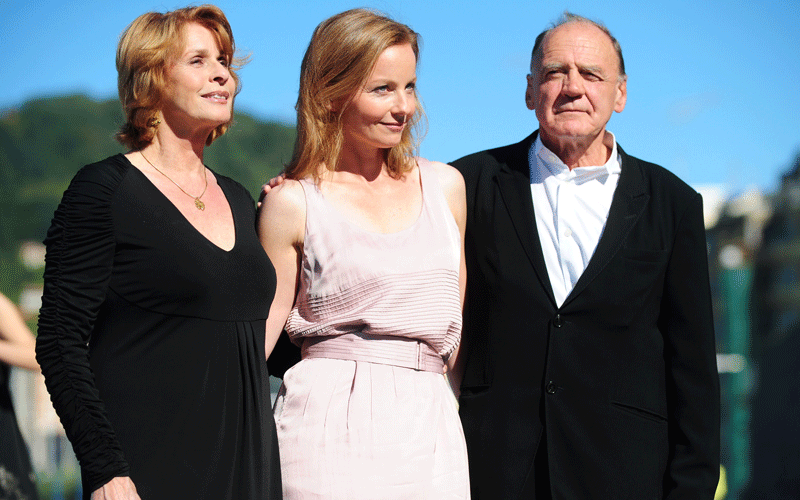 Austrian actress Senta Berger (L), German actress Carina Wiese (C) and Swiss actor Bruno Ganz (R) pose during a photocall after the screening of their film "Satte Farben vor Schwarz" (Colours in the Dark) during the 58th San Sebastian International Film Festival. (AFP)