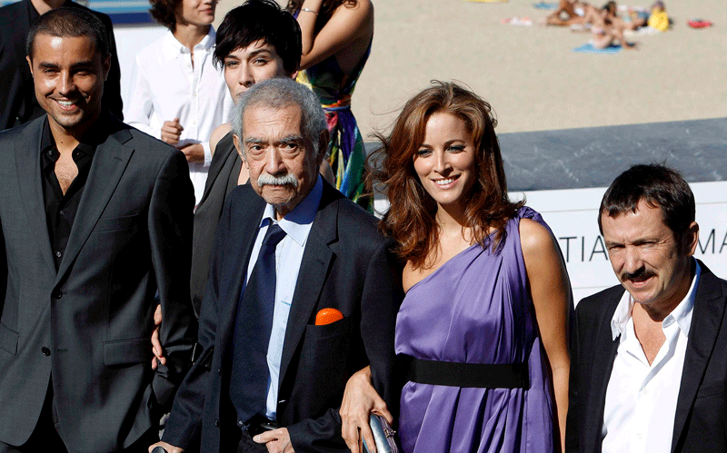 Chilean film director Raul Ruiz (2-L) poses with Portuguese actors Ricardo Pereira (L), Maria Joao Bastos (2-R) and Adriano Luz (R) after the photocall of their film 'Misterios de Lisboa' (Mysteries of Lisbon), at the 58th Annual San Sebastian International Film Festival, held in San Sebastian, Basque Country, northern Spain. (EPA)