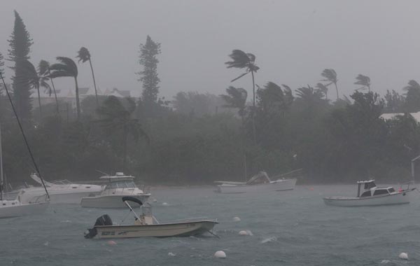 Wind and rain batter the trees and boats in Mangrove Bay as Hurricane Igor moves onto Bermuda. (AP)