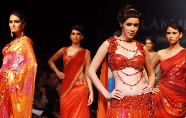 Models take to the catwalk wearing creations by Satya Paul at the Lakme Fashion Week Winter/Festive 2010 Grand Finale in Mumbai, India. (EPA)