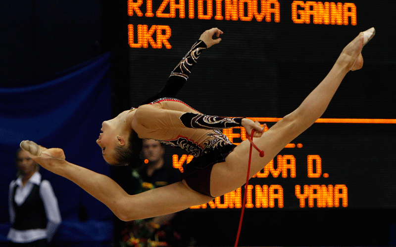 Ganna Rizatdinova of Ukraine performs during Rhythmic Gymnastics World Championships in Moscow. (REUTERS)