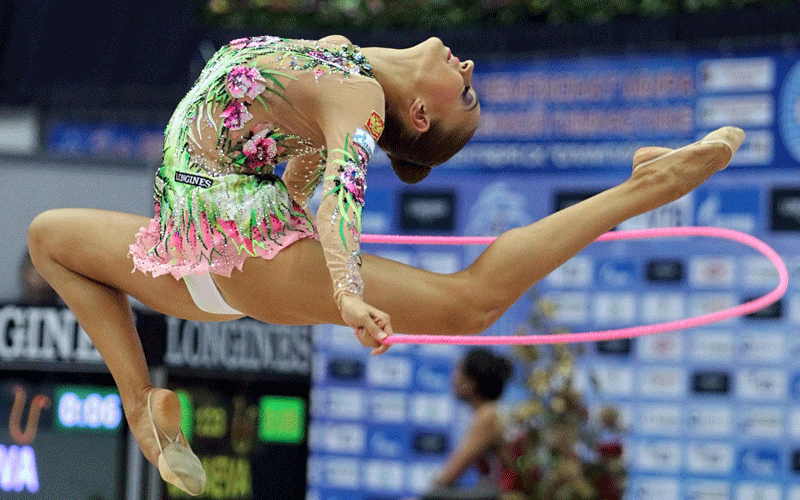 Evgenia Kanaeva of Russia performs her Individual Qualifications programme on the rope at the 30th Rhythmic Gymnastics World Championships in Moscow. (EPA)