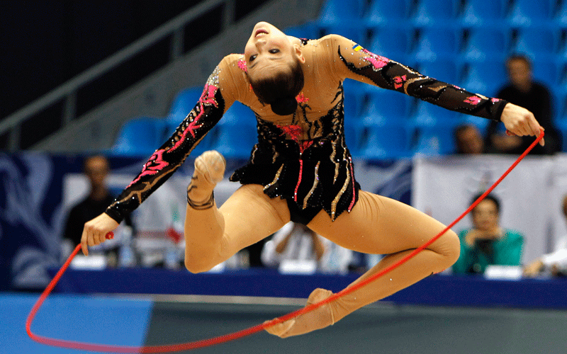 Alina Maksymenko of Ukraine performs during the Rhythmic Gymnastics World Championships in Moscow. (REUTERS)