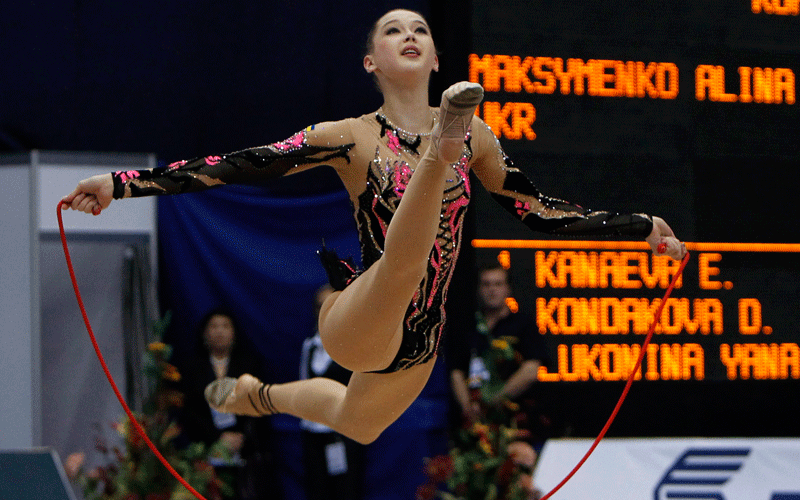 Alina Maksymenko of Ukraine performs during Rhythmic Gymnastics World Championships in Moscow. (REUTERS)