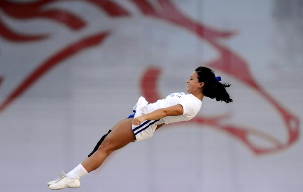 A Kentucky University cheerleader is tossed into the air during the Opening Ceremony for the World Equestrian Games in Lexington, Kentucky, USA. (EPA)