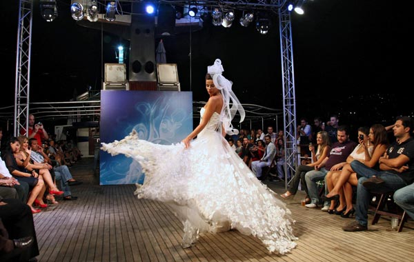 A model presents a creation from the Fall-Winter 2010/11 collection of Lebanese designer Dany Al-Atrach during the Beirut Boat Fashion Nights on board of a sailing ship on the Lebanese coast, Lebanon. (EPA)