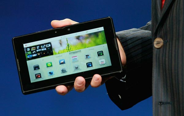 RIM President and Co-Chief Executive Officer Mike Lazaridis announces the new BlackBerry PlayBook as he delivers a keynote address at the BlackberryDevCon 2010. (AFP)