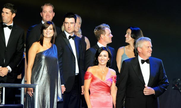 Colin Montgomerie and his wife Gaynor Montgomerie, along with members of the European Ryder Cup team, walk onstage during Welcome To Wales at Millennium Stadium. (GETTY IMAGES)