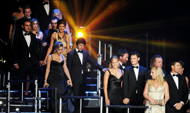 Members of the European Ryder Cup team stand onstage with their wives and partners during Welcome To Wales at Millennium Stadium in Cardiff, Wales. (GETTY IMAGES)