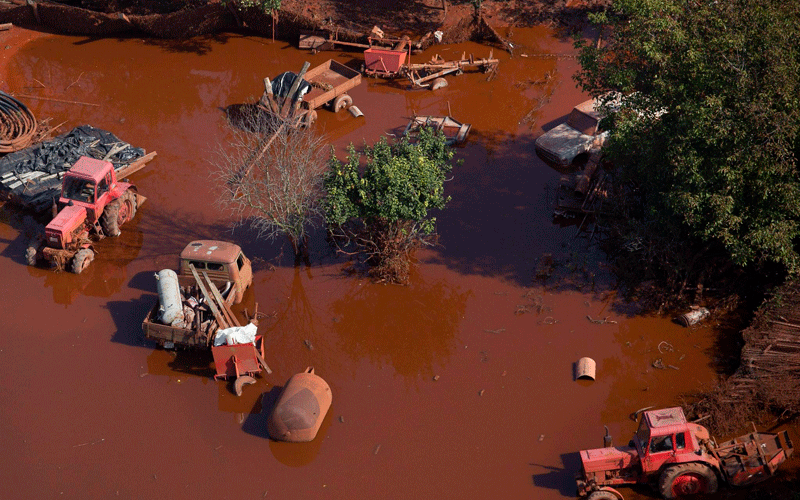 An aerial view of tractors and vehicles standing in red mud in Devecser, 164 kms southwest of Budapest, Hungary. (EPA)