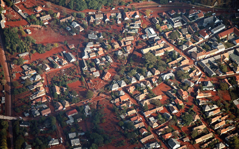 A handout picture released by Greenpeace on 08 October 2010 shows an aerial view of the toxic Hungarian flood, covering fields, streets, canals and entire villages. (EPA)