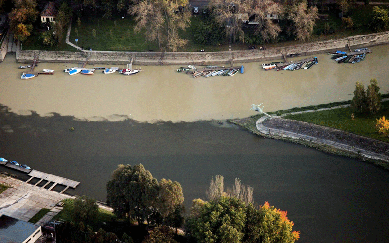 A handout picture released by Greenpeace on 08 October 2010 shows an aerial view of the toxic Hungarian flood, running into the nearest rivers Raba and Marcal. (EPA)