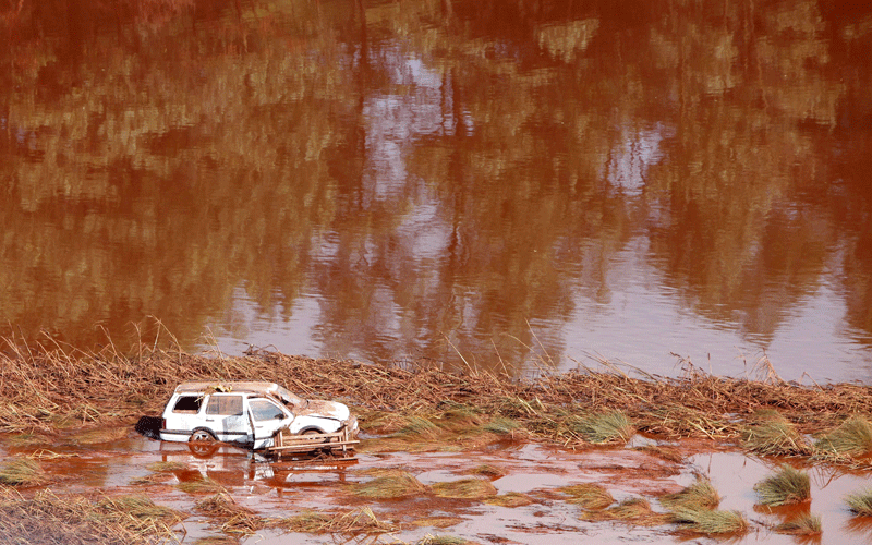 An aerial photo taken on October 8, 2010 shows a damaged and swept car, few kilometers from the village of Kolontar, nearby Torna stream, some 160 kilometers southwest of Hungarian capital  Budapest.(AFP)