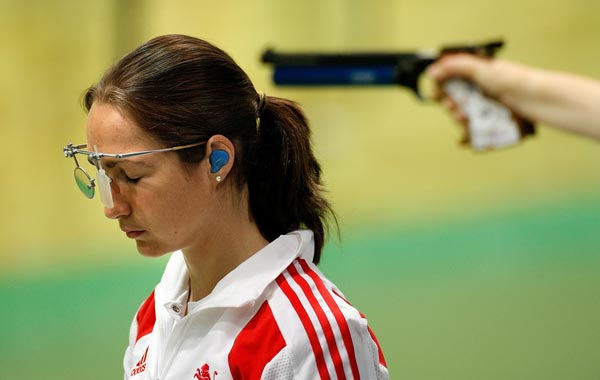 Gorgs Geikie of England looks on in the 10m Air Pistol Womens Pairs event at Dr Karni Singh Shooting Range during day nine of the Delhi 2010 Commonwealth Games. (GETTY)