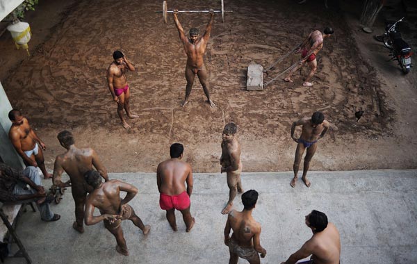 Kushti, an Indo-Pakistani form of wrestling, is several thousand years old and is a national sport in Pakistan. In ancient times it was used for combat and self-defence. Pakistani wrestlers Azhar Hussain and Muhammad Inam have won gold medals at the 2010 Commonwealth games in Delhi, India. (AFP)