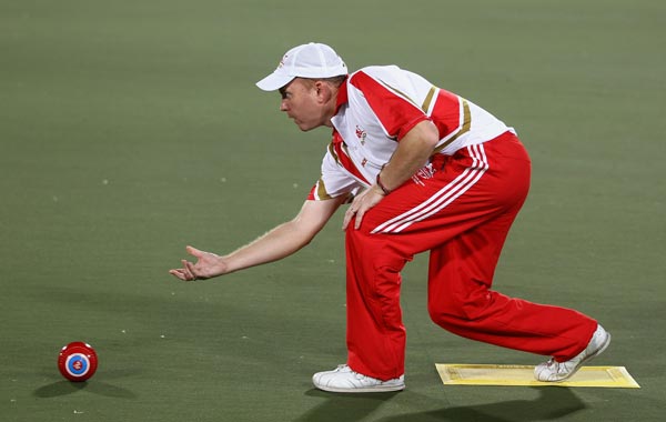 Stuart Airey of England completes in the Men Pairs Final at JN Sports Complex during day eight of the Delhi 2010 Commonwealth Games. (GETTY)