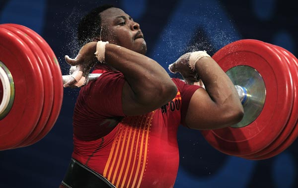 Frederic Tefot of Cameroon lifts during the mens 105+kg Weightlifting competition at JN Sports Complex during day eight of the Delhi 2010 Commonwealth Games. (GETTY)