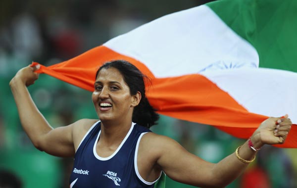 Krishna Poonia of India celebrates after winning gold in the women's discus final at Jawaharlal Nehru Stadium during day eight of the Delhi 2010 Commonwealth Games. (GETTY)