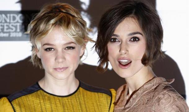 Actresses Carey Mulligan and Keira Knightley pose ahead of the premiere of their film "Never Let Me Go" in Leicester Square, central London. (REUTERS)