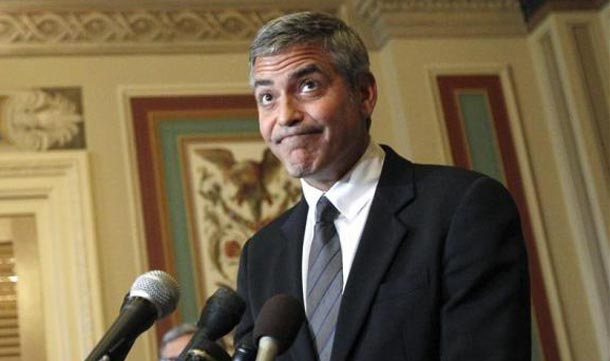 Actor George Clooney pauses as he speaks after a meeting about Sudan with Senator Dick Lugar on Capitol Hill, outside the Senate Foreign Relations room. (REUTERS)