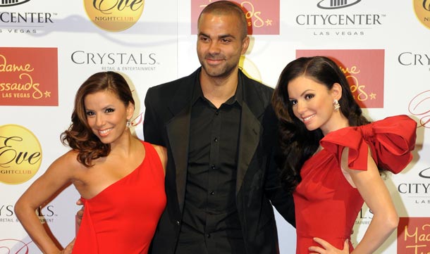 Actress Eva Longoria Parker (L) from the TV show "Desperate Housewives" poses with her husband NBA star Tony Parker as she unveils her Madame Tussauds Las Vegas wax figure at her nightclub, Eve, in Las Vegas. (AFP)