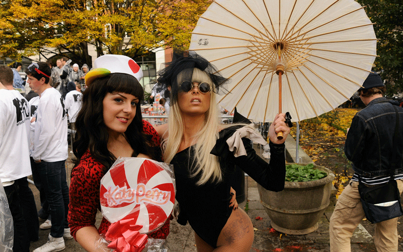 (L-R) Katy Perry lookalike Delia Marie Williams and Lady Gaga lookalike Victoria Cluskey pose before the MTV Giant Tomato Fight in Golden Square on November 2, 2010 in London, England. The Tomato fight was atrranged by MTV to promote the European Music Awards which will be held in Madrid on November 7th. (GETTY IMAGES)