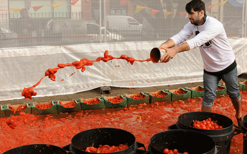 MTV staff prepare the tomatoes prior to the MTV Giant Tomato Fight in Golden Square on November 2, 2010 in London, England. The tomato fight, which was organised by the music television channel MTV, aimed to recreate the Spanish 'Tomatina' food throwing contest, and is being held to promote the European Music Awards which will be held in Madrid on November 7, 2010. (GETTY IMAGES)