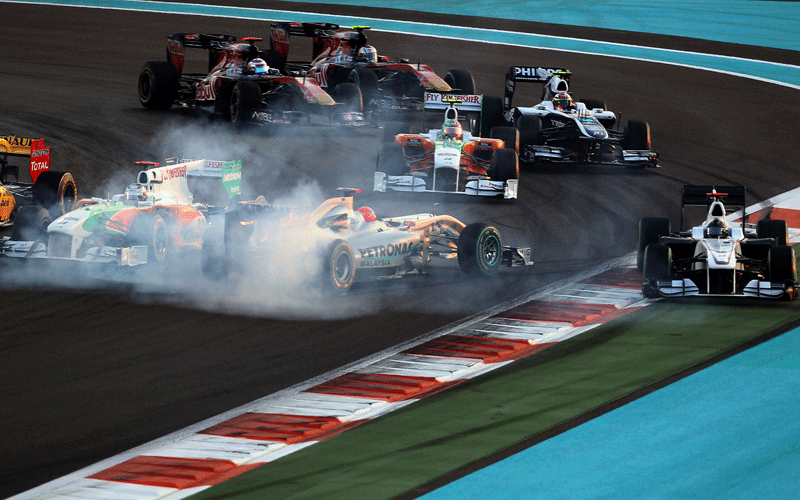 Mercedes GP's German driver Michael Schumacher spins at the Yas Marina circuit in Abu Dhabi, during the Abu Dhabi Formula One Grand Prix. (AFP)