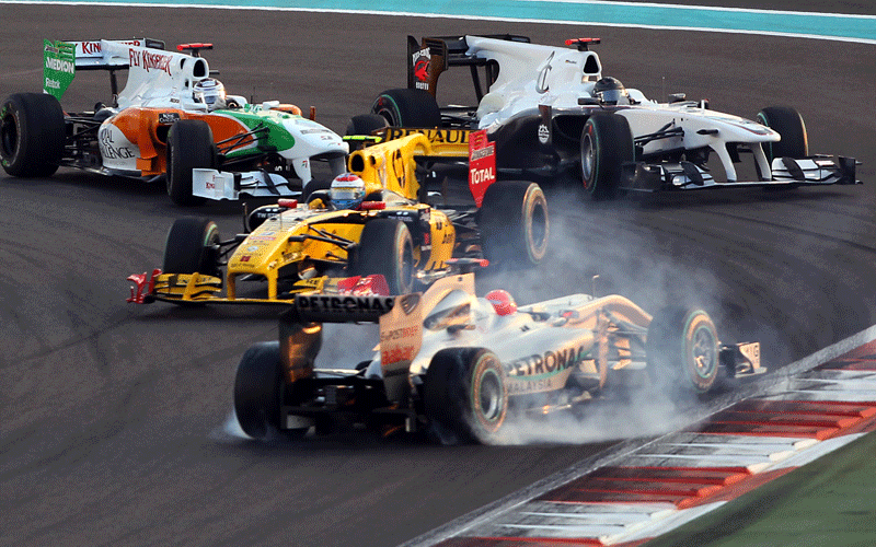 Mercedes GP's German driver Michael Schumacher spins at the Yas Marina circuit in Abu Dhabi, during the Abu Dhabi Formula One Grand Prix. (AFP)