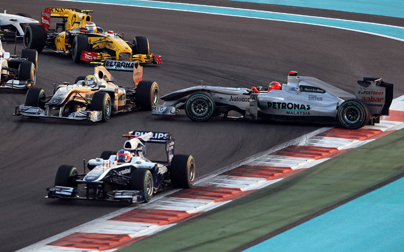 Mercedes GP's German driver Michael Schumacher spins at the Yas Marina circuit in Abu Dhabi, during the Abu Dhabi Formula One Grand Prix. (AFP)