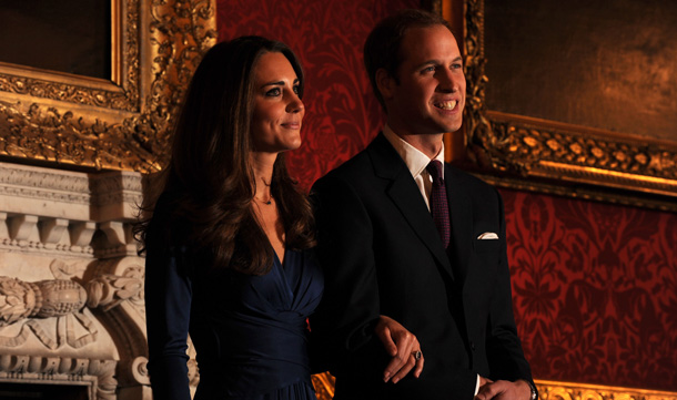 Britain's Prince William and his fiancée Kate Middleton pose for photographers during a photocall to mark their engagement, in the State Rooms of St James’s Palace, central London.  Britain's Prince William has given his fiancee Kate Middleton the engagement ring that belonged to his late mother Diana, Princess of Wales, Clarence House said Tuesday.  The blue sapphire and diamond ring was given to Diana by William's father, Prince Charles, when they became engaged in February 1981. Charles and Diana divorced in 1996 and she was killed in a car crash in Paris the following year. (AFP)