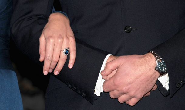 A close up of Prince William's watch and Kate Middleton's engagement ring as they pose for photographs in the State Apartments of St James Palace in London, England. After much speculation, Clarence House today announced the engagement of Prince William to Kate Middleton. The couple will get married in either the Spring or Summer of next year and continue to live in North Wales while Prince William works as an air sea rescue pilot for the RAF. The couple became engaged during a recent holiday in Kenya having been together for eight years. (GETTY IMAGES)