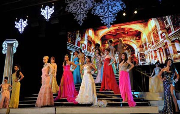 Contestants pose on stage during the Miss International Queen 2010 beauty pageant. (AFP)