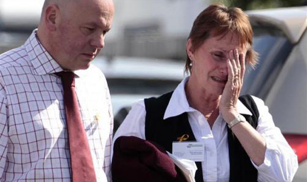 A woman reacts after learning of a second explosion in the Pike River coal mine at a briefing by mine authorities and police in Greymouth on New Zealand's west coast. (REUTERS)