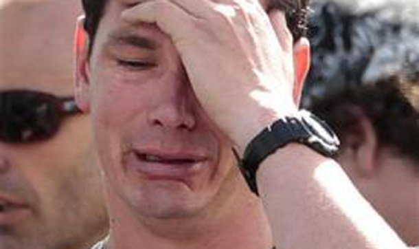 A family member of a miner trapped underground in the Pike River coal mine reacts after learning of a second explosion in the mine at a briefing by mine authorities and police in Greymouth on New Zealand's west coast. (REUTERS)