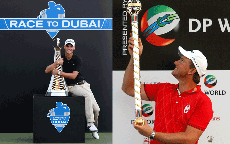 Martin Kaymer of Germany poses with the trophy of European golf player of the year and Robert Karlsson of Sweden holds the trophy after winning the Dubai World Championship at the end of the Dubai World Championship at the Earth Course of the Jumeirah Golf Estates in the Gulf emirate. (AFP)