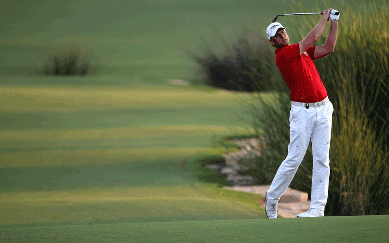 Robert Karlsson of Sweden plays a shot on the last day of the Dubai World Championship at the Earth Course of the Jumeirah Golf Estates in the Gulf emirate. (AFP)