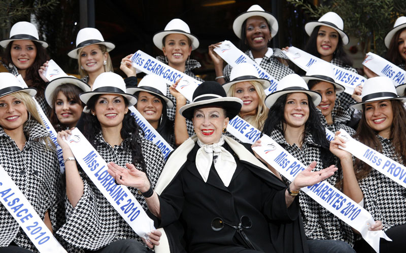 Genevieve de Fontenay (C), head of the "Genevieve de Fontenay national committee", poses with official candidates of Miss National 2011 beauty contest on December 2, 2010 in Paris. (AFP)