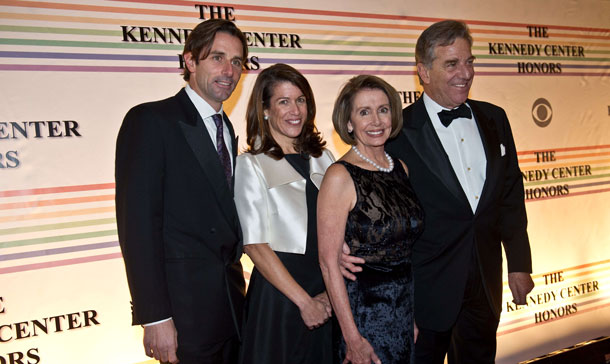 US House Speaker Nancy Pelosi (3L) and family pose on the red carpet of the Kennedy Center Honors gala performance at the Kennedy Center in Washington. (AFP)