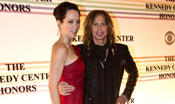 Aerosmith singer Steven Tyler and guest pose on the red carpet of the Kennedy Center Honors gala performance at the Kennedy Center in Washington. (AFP)