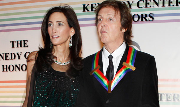 Nancy Shevell, left, and Paul McCartney pose on the red carpet at the Kennedy Center Honors, in Washington. The 2010 honorees are Merle Haggard, Jerry Herman, Bill T. Jones, Paul McCartney, and Oprah Winfrey. (AP)