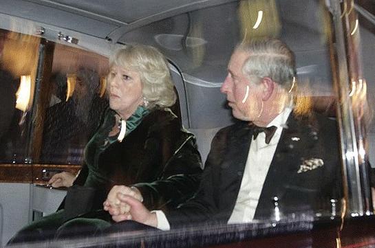 Prince Charles and his wife Camilla react after the attack. They couple were unhurt although they were clearly alarmed. Police have promised a full investigation (AP)