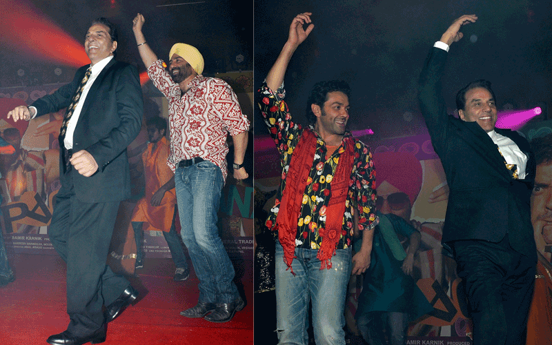 Indian Bollywood actors Dharmendra Singh Deol, Sunny Deol and Bobby Deol dance during the Indian comedy-drama film "Yamla Pagla Deewana" music launch in Mumbai. (AFP)