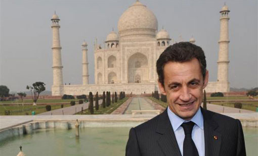 France's President Nicolas Sarkozy walks outside the Taj Mahal after a visit on the second day of Sarkozy's visit in India January 26, 2008. (REUTERS)