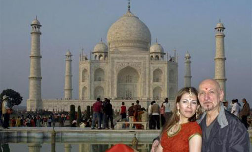 British actor Ben Kingsley (R) and his wife Daniela pose for a picture during their visit at the historic Taj Mahal in Agra December 2, 2009. (REUTERS)